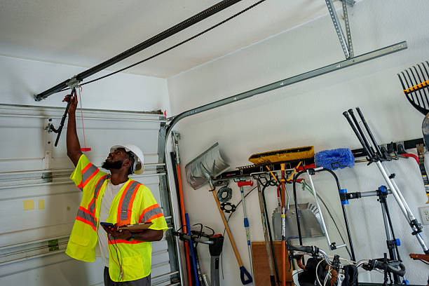 Professional Garage Door Panel Replacement technician working in Winsted, CT
